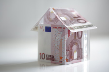 House made from ten euro banknotes concept for property prices, mortgage or home finances